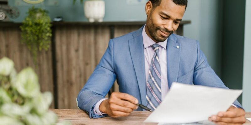 A person reviewing a document